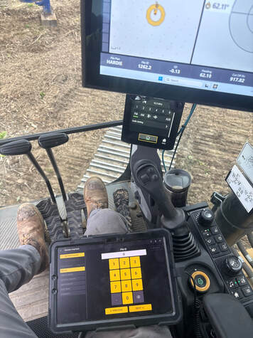 Piled device strapped to Operators leg for easy data entry.